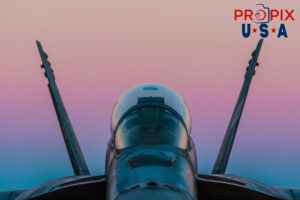 Sunrise beginning behind a F-18 hornet at the 2017 Sun N Fun airshow in Lakeland Florida. Aircraft code F18.