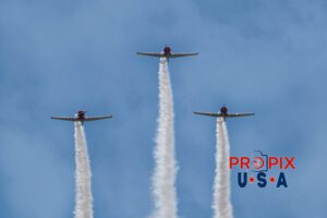 Sky Typers aerobatic team performing at the 2017 Sun N Fun airshow in Lakeland Florida. The aircraft are WWII era North American T-6 Texans. Aircraft code AT6