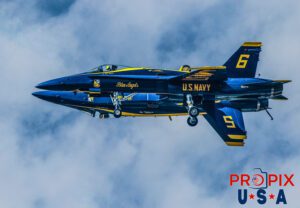 Blue Angels F-18 Hornets Performing at the 2017 Sun N Fun Airshow in Lakeland Florida. #5 Commander Frank Weisser: Lead Solo #6 Lt. Tyler Davies: Opposing Solo Aircraft code F18.