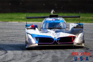 Just concentrate.. The #24 BMW GTP is making it's way through the infield in the early morning hours of the 2024 Rolex 24 at Daytona.