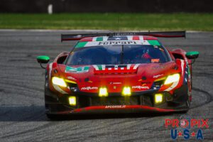 As the Ferrari had endured the night, the dawn was highlighting some of the scars from the race. The intensity of the driver's desire to perform can easily be extrapolated by looking at their attentiveness behind the wheel. This was early in the morning of IMSA's, Rolex 24 hours at Daytona 2024.