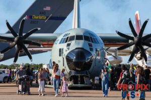 1,000 words... to describe airshow attendees..! This photo shows a fantastic diversity of airshow crowds. Young to old(er) the curious, photo takers, a pilot sharing info and a little girl who has clearly had enough fun. This C-130 with Skis was at the 2024 Sun N Fun airshow in Lakeland Florida. Aircraft code: C130 Airport code(s): KLAL, LAL Photo date: 4-13-2024