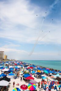 Delta Head On / Opposing 360 maneuver over Pensacola beach. BLUE ANGELS PERFORMING ON THEIR HOME TURF, OR RATHER HOME SAND..! Aircraft code: F18 Airshow location: Pensacola Beach, Florida Photo date: 7-13-2024