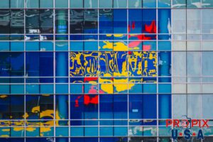 After a rough night at Daytona...! The Sunoco fuels sign reflected off the building behind the garages at Daytona International Speedway in the early morning hours.