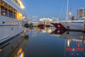 Big, bigger, biggest..! Yachts docked at a marina.