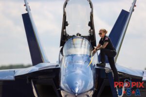 Perched on top..! Petty Officer and #1 Crew Chief Chelsea Kendrick assists Commander Adam Bryan prepare for the aerial demonstration at the 2025 Smyrna Tennessee air show. #1 Commander Adam Bryan (Commanding Officer) Aircraft code: F18 Airport code(s): MQY, KMQY Photo date: 6-8-2025