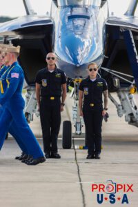 Proud of perfection.. Petty Officers Alexander and Kendrick standing at attention as the six Blue Angels pilots pass by aircraft #1 to complete their demonstration. #1 Commander Adam Bryan (Commanding Officer) #2 Commander Jack Keilty (Right Wing) #3 Major Brandon Wilkins (Left Wing) #4 Lieutenant Commander Wes Perkins (Slot) #5 Commander Thomas Zimmerman (Lead Solo) #6 Lieutenant Commander Connor O'Donnell (opposing Solo) Aircraft code: F18 Airport code(s): MQY, KMQY Photo date: 6-8-2025