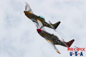N51MX 1945 P-51 Mustang (Mad Max) N51LW 1962 P-51 Mustang (The Little Witch) Jack Aces P-51 flight demonstration team performing at the 2025 Brunswick Georgia airshow. Aircraft code: P51 Airport code(s): BQK, KBQK Photo date: 5-17-2025