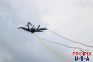 Vapor wings. Major Melanie "Mach" Kluesner climbing at just the right angle as to allow massive vapor clouds to form over her F-35 at the 2025 Smyrna Tennessee airshow. Aircraft code: F35 Airport code(s): MQY, KMQY Photo date: 6-7-2025