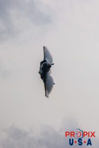 Birds of a feather.. Major Melanie "Mach" Kluesner performing a high speed banking turn with vapor clouds forming a bird wing like shape on her F-35 at the 2025 Smyrna Tennessee airshow. Aircraft code: F35 Airport code(s): MQY, KMQY Photo date: 6-7-2025