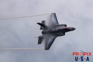 You can bank on that..! Major Melanie "Mach" Kluesner performing a high speed banking turn with vapor clouds forming around her F-35 at the 2025 Smyrna Tennessee airshow. Aircraft code: F35 Airport code(s): MQY, KMQY Photo date: 6-7-2025