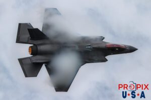 Vapor maker.. Major Melanie "Mach" Kluesner performing a high speed banking turn with huge vapor clouds forming around her F-35 at the 2025 Smyrna Tennessee airshow. Aircraft code: F35 Airport code(s): MQY, KMQY Photo date: 6-7-2025