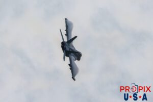 Bad ass bird..! An F-18 demonstrator is making a high speed banking turn with vapor clouds forming a bird wing like shape on the upper surfaces of the aircraft at the 2025 Smyrna Tennessee airshow. Aircraft code: F18 Airport code(s): MQY, KMQY Photo date: 6-7-2025