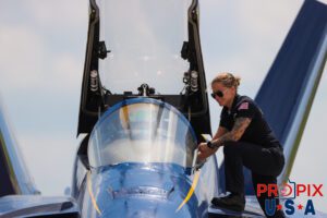 You gotta have fun doing what your doing. Petty Officer and #1 Crew Chief Chelsea Kendrick laughs with Commander Adam Bryan as they prepare for the aerial demonstration at the 2025 Smyrna Tennessee air show. #1 Commander Adam Bryan (Commanding Officer) Aircraft code: F18 Airport code(s): MQY, KMQY Photo date: 6-8-2025