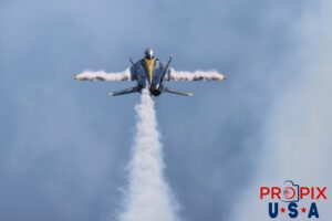 Getting a little lift.. Upon completion of the "Delta Breakout / Head On", Blue Angel #4 passes over the crowd and the climb out generates a vapor cloud over the wings. #4 Lieutenant Commander Wes Perkins (Slot) Aircraft code: F18 Airport code(s): MQY, KMQY Photo date: 6-8-2025