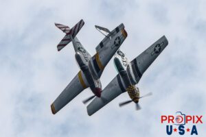 N51MX 1945 P-51 Mustang (Mad Max) N51LW 1962 P-51 Mustang (The Little Witch) Jack Aces P-51 flight demonstration team performing at the 2025 Brunswick Georgia airshow. Aircraft code: P51 Airport code(s): BQK, KBQK Photo date: 5-17-2025