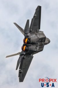 F-22 Raptor performing a high speed banking turn with afterburners engaged at the 2025 Brunswick Georgia airshow. Aircraft code: F22 Airport code(s): BQK, KBQK Photo Date: 5-17-2025