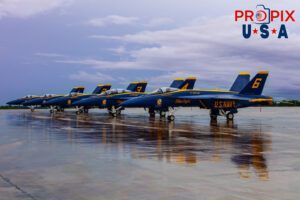 After the Saturday show was canceled due to a passing rain shower, the rain soaked tarmac created a beautiful canvas for the Blue Angels to shine from. (note the #5 aircraft was missing from the lineup) #1 Commander Adam Bryan (Commanding Officer) #2 Commander Jack Keilty (Right Wing) #3 Major Brandon Wilkins (Left Wing) #4 Lieutenant Commander Wes Perkins (Slot) #6 Lieutenant Commander Connor O'Donnell (opposing Solo) Aircraft code: F18 Airport code(s): MQY, KMQY Photo date: 6-8-2025