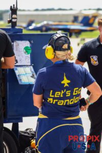 Presumed freinds and family members of Blue Angels #3 wore t-shirts with an F-18 outline and the text "Let's go Brandon" underneath it. #3 Major Brandon Wilkins (Left Wing) Airport code(s): MQY, KMQY Photo date: 6-8-2025