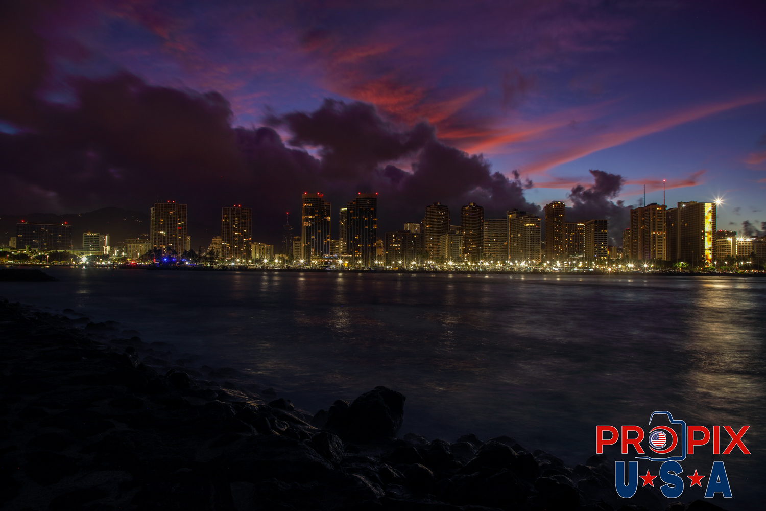 Hawaii Yacht Club and Honolulu at sunrise.