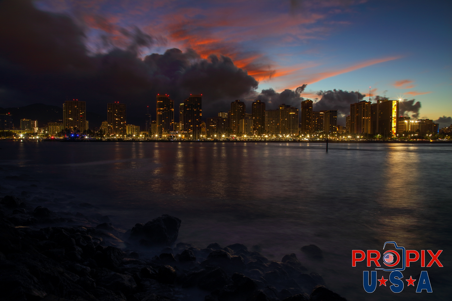 Hawaii Yacht Club and Honolulu at sunrise.
