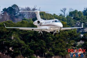 N335QS 2014 Embraer Phenom 300 E55P NetJets PDK (KPDK) Peachtree Dekalb airport Atlanta Georgia Photo date: 12-19-2021
