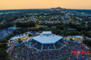 Concert at Lakewood amphitheater with Atlanta skyline at dusk Photo date: 7-18-2014