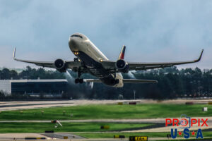 Delta Airlines Boeing 737 departing Atlanta international with exhaust gasses clearly visible. Aircraft code: B737 Airport code(s): ATL, KATL Photo date: 2-25-2017 DAL