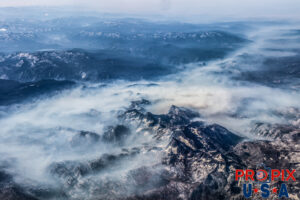 Aerial photo of smoke from California wildfires settling in the valleys. Photo date: 8-17-2018