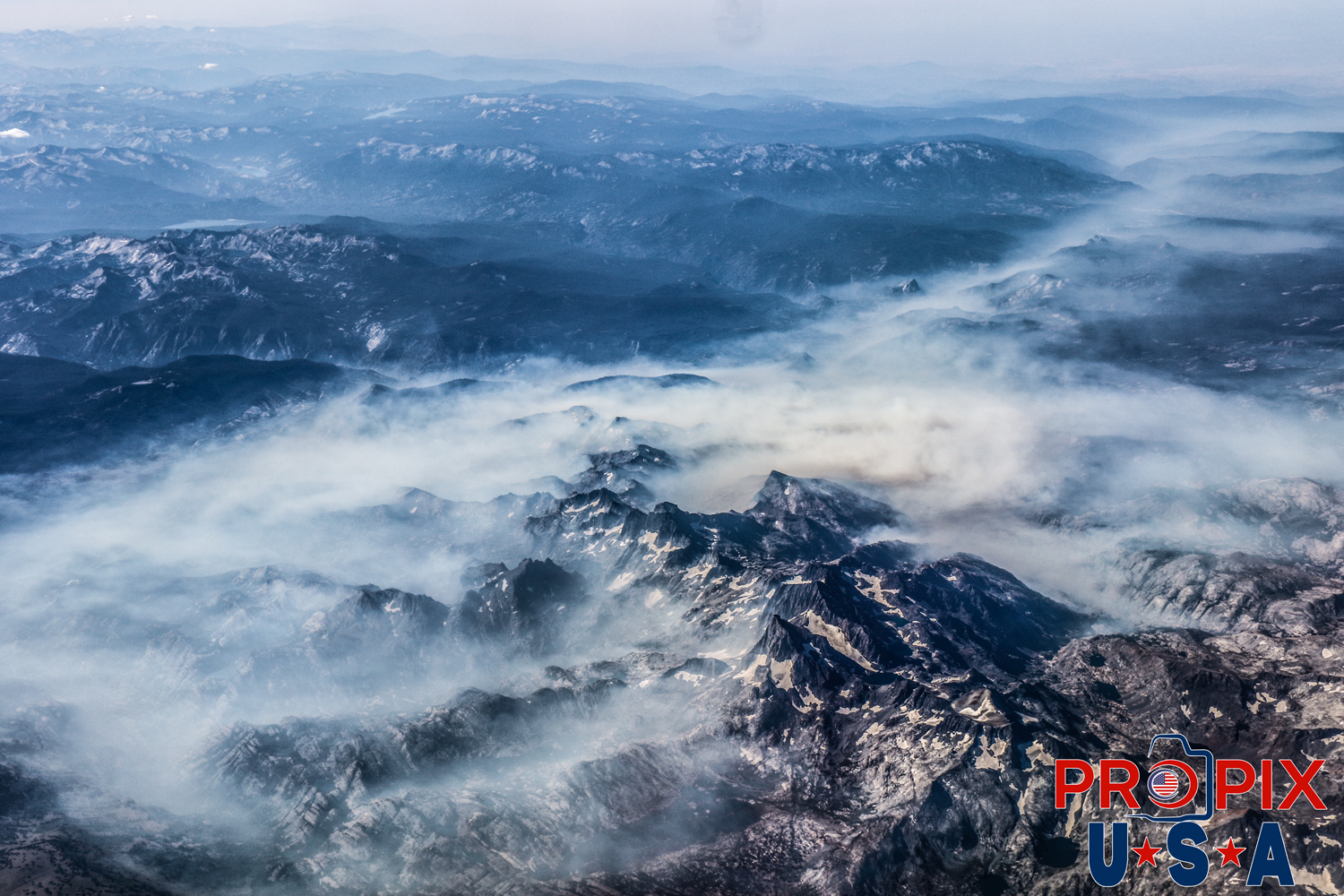 Aerial photo of smoke from California wildfires settling in the valleys. Photo date: 8-17-2018