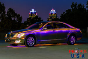 Mercedes Benz S550 light painted with King and queen towers in background Atlanta Georgia