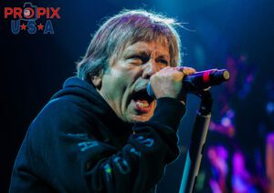 Iron Maiden's Bruce Dickinson singing with extreme intensity during The Book of Souls World Tour. Bruce Dickinson: Vocals