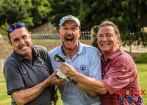 Having fun in Dallas..! Dave Murray and Nicko McBrain try to wrestle away the newly acquired custom Callaway from one of Iron Maiden's management team. The golf club had "The Trooper" inscribed on it as well as a likeness of the same.