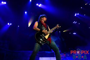 Adrian Smith of Iron Maiden always plays his guitar with a high level of intensity.