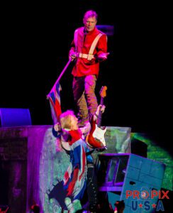 Iron Maiden performing "The Trooper" during their Book of Souls World Tour. Bruce Dickinson has a British flag draped over Janick Gers.